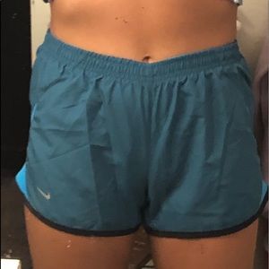 Blue nike running shorts
